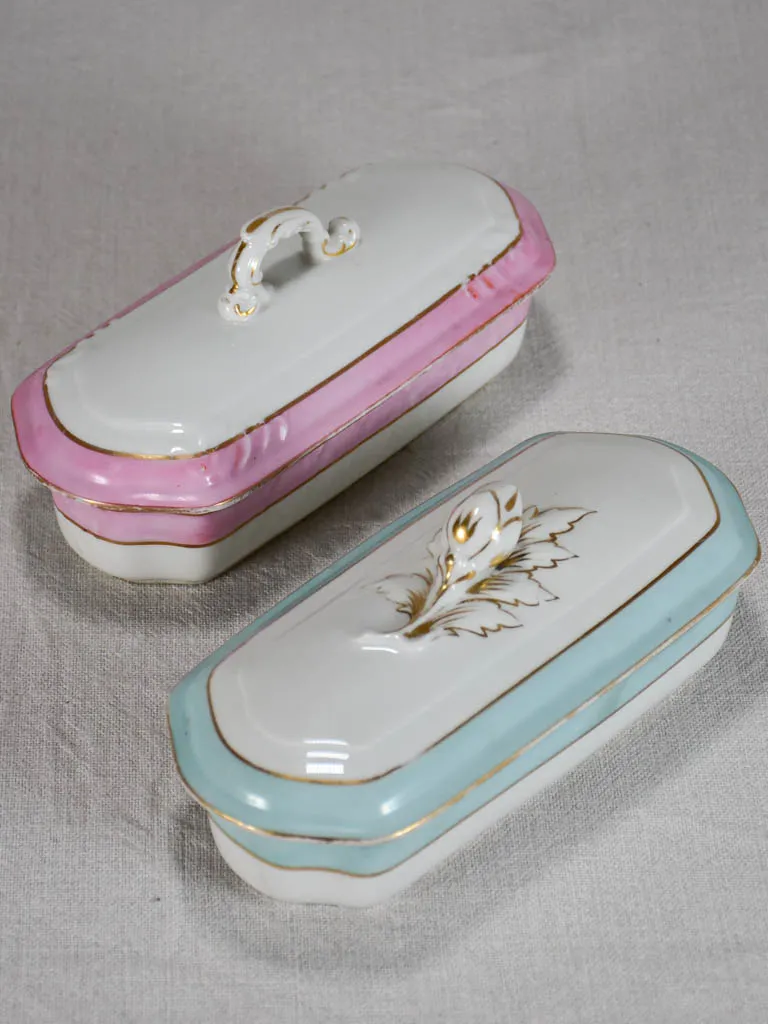 Two vintage French toothbrush holders